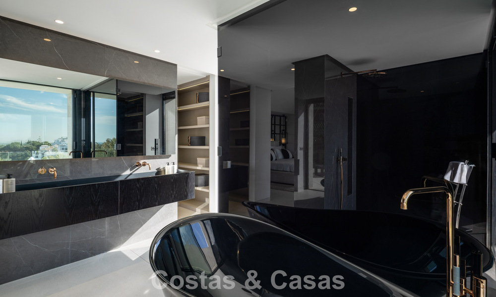 Avant-garde designer villa with panoramic sea views for sale in a gated community in Benahavis - Marbella 779981