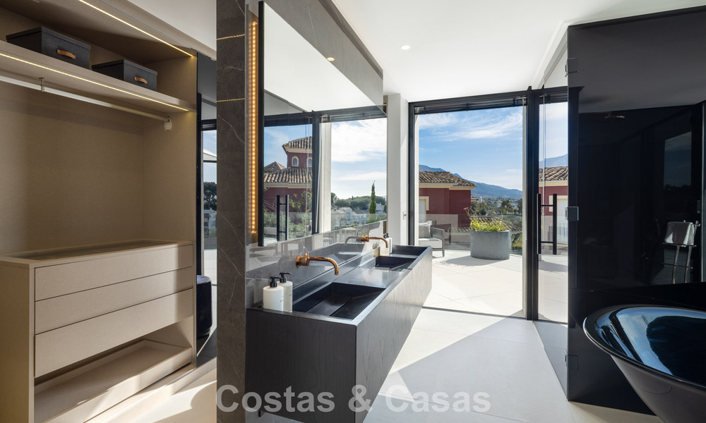Avant-garde designer villa with panoramic sea views for sale in a gated community in Benahavis - Marbella 779982