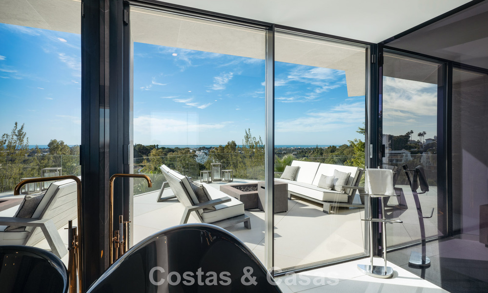 Avant-garde designer villa with panoramic sea views for sale in a gated community in Benahavis - Marbella 779984