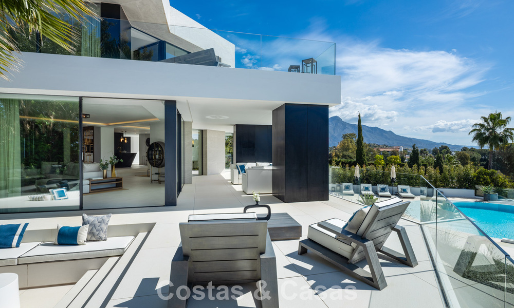 Avant-garde designer villa with panoramic sea views for sale in a gated community in Benahavis - Marbella 779993