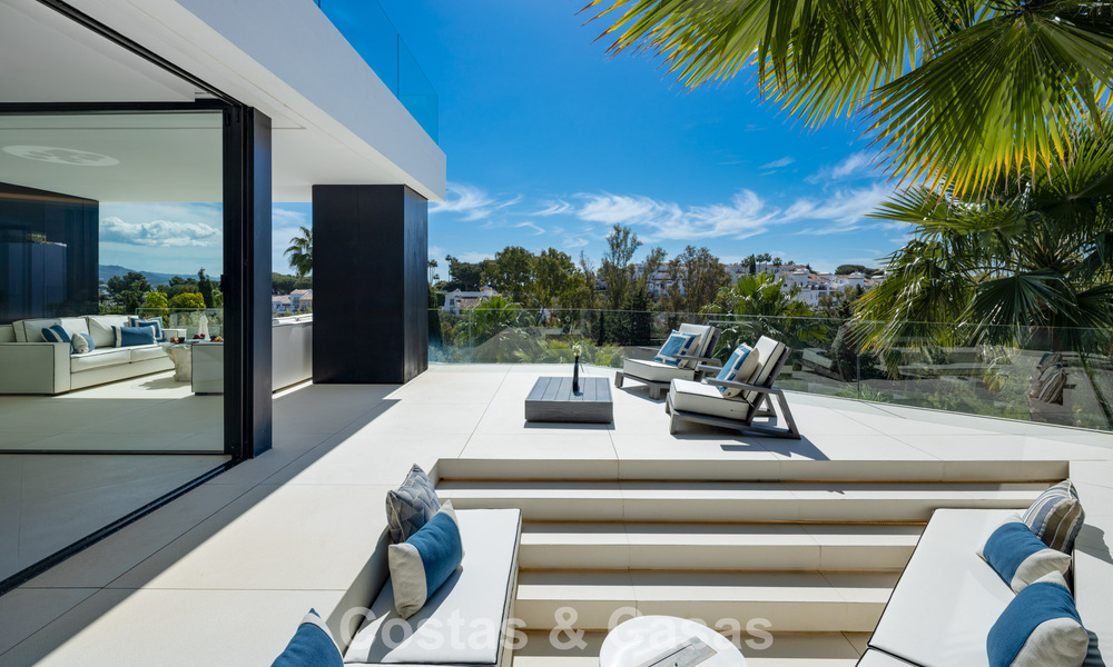 Avant-garde designer villa with panoramic sea views for sale in a gated community in Benahavis - Marbella 779994