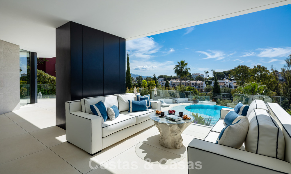 Avant-garde designer villa with panoramic sea views for sale in a gated community in Benahavis - Marbella 779995