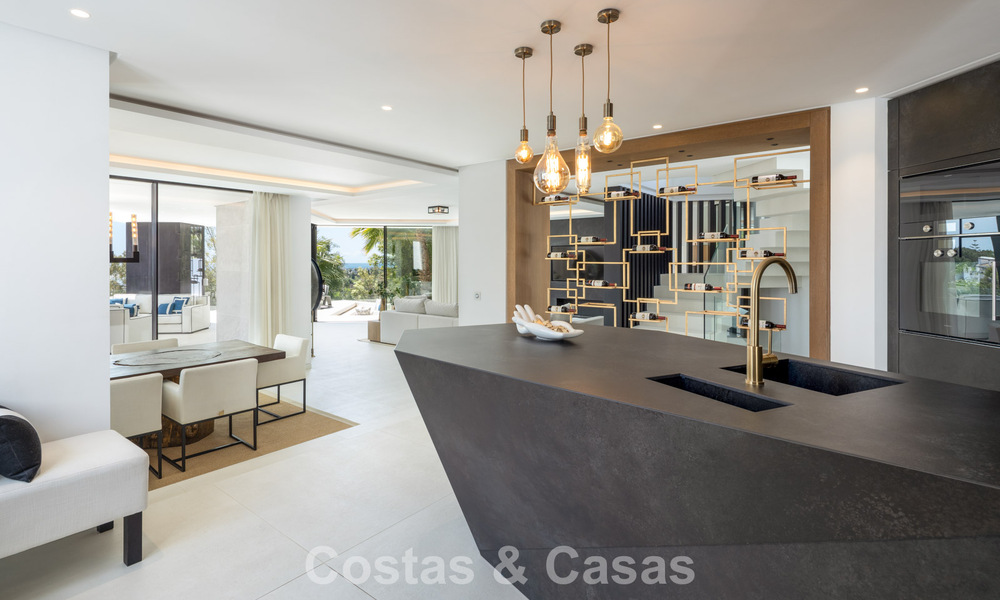Avant-garde designer villa with panoramic sea views for sale in a gated community in Benahavis - Marbella 780008