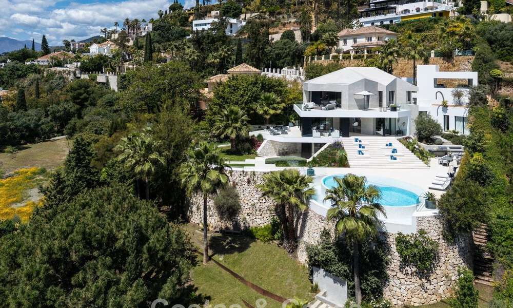 Avant-garde designer villa with panoramic sea views for sale in a gated community in Benahavis - Marbella 780010