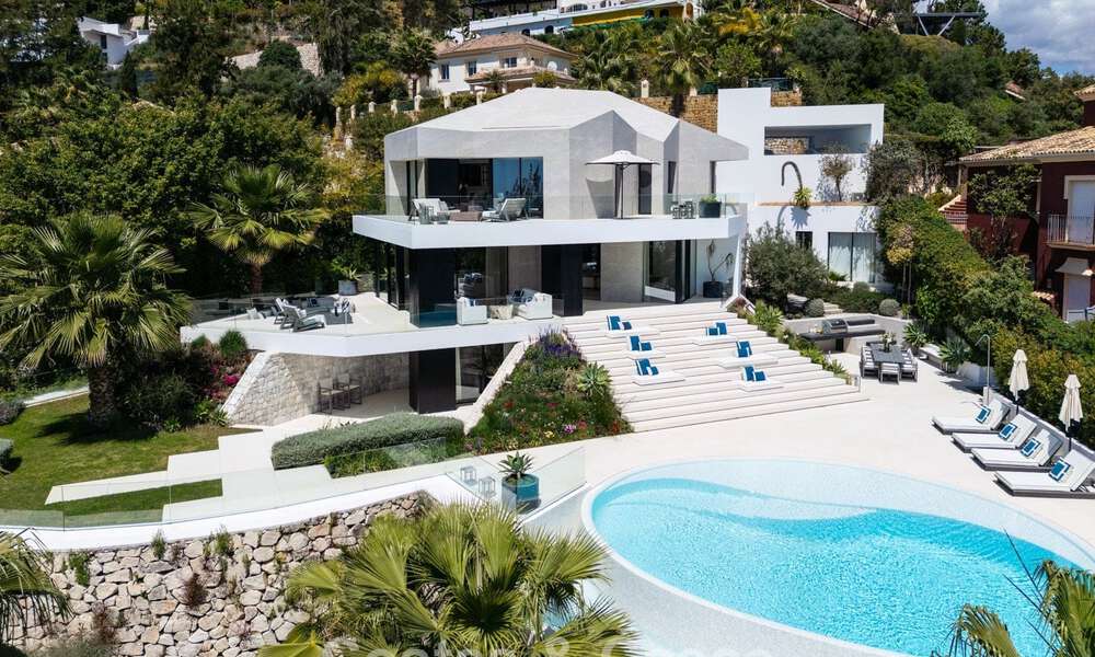 Avant-garde designer villa with panoramic sea views for sale in a gated community in Benahavis - Marbella 780011