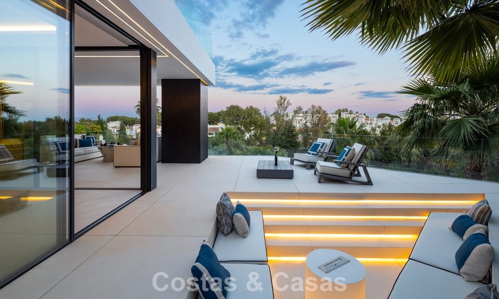Avant-garde designer villa with panoramic sea views for sale in a gated community in Benahavis - Marbella 780012