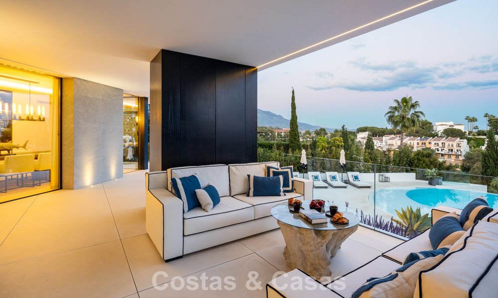 Avant-garde designer villa with panoramic sea views for sale in a gated community in Benahavis - Marbella 780015