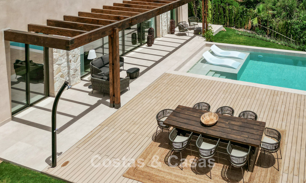 Move-in ready luxury villa with Ibizan style for sale in a highly sought after urbanisation of Benahavis - Marbella 780058