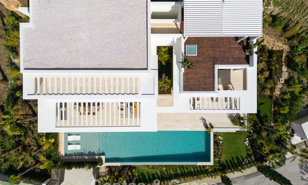 High-end luxury villa with panoramic views for sale in a golf resort on the Golden Mile in Benahavis - Marbella 780116