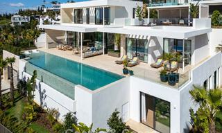 High-end luxury villa with panoramic views for sale in a golf resort on the Golden Mile in Benahavis - Marbella 780117 