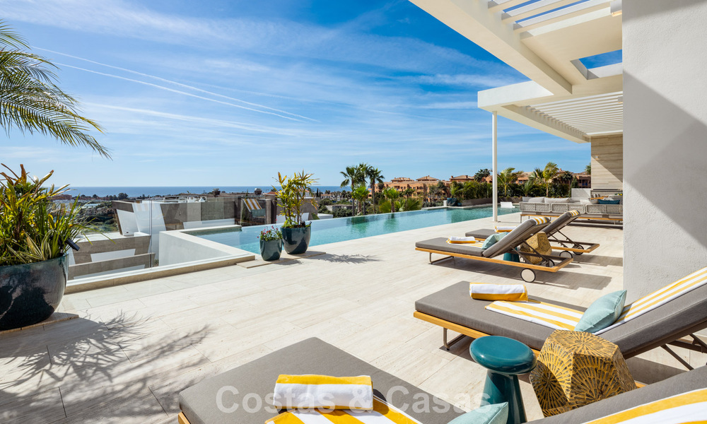 High-end luxury villa with panoramic views for sale in a golf resort on the Golden Mile in Benahavis - Marbella 780128