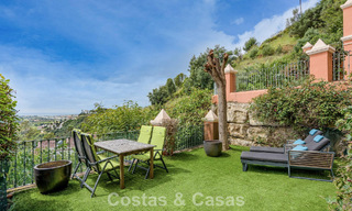 Spacious raised garden apartment with panoramic sea views for sale in Benahavis - Marbella 780212 