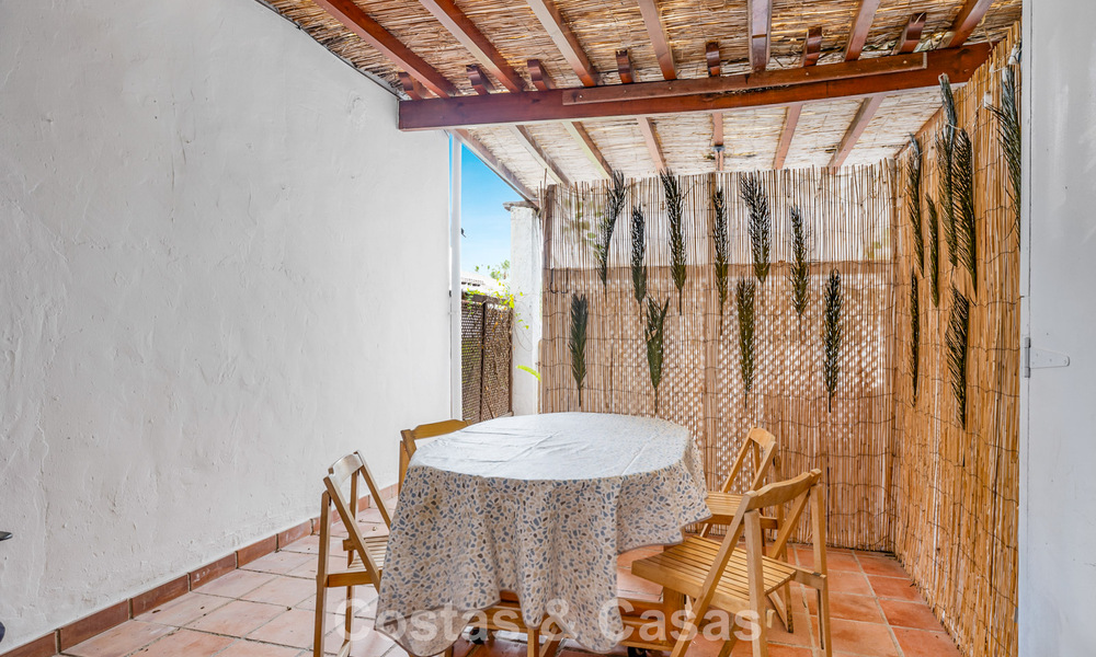 Townhouse for sale with sea views in a frontline beach complex close to Estepona centre 780564