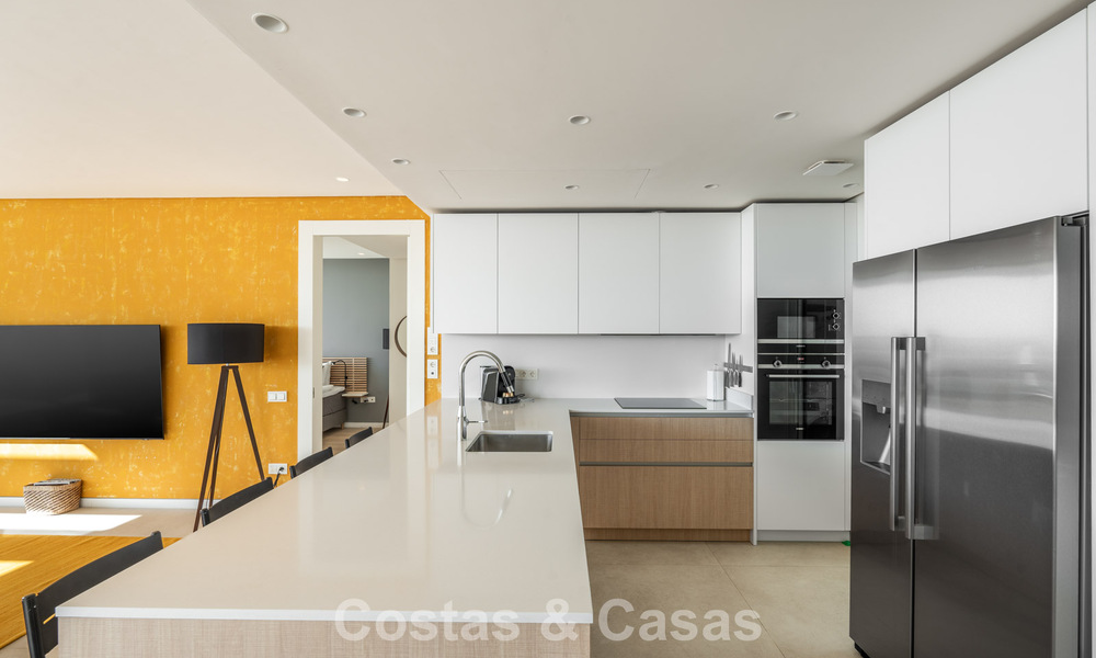 Move-in ready, modern-sleek penthouse with panoramic sea views for sale, in a luxury resort near Marbella town 780747