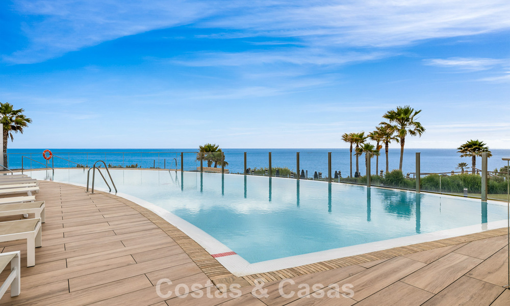 Luxurious, modern apartment with sea views for sale directly on the beach in Estepona, Costa del Sol 780802