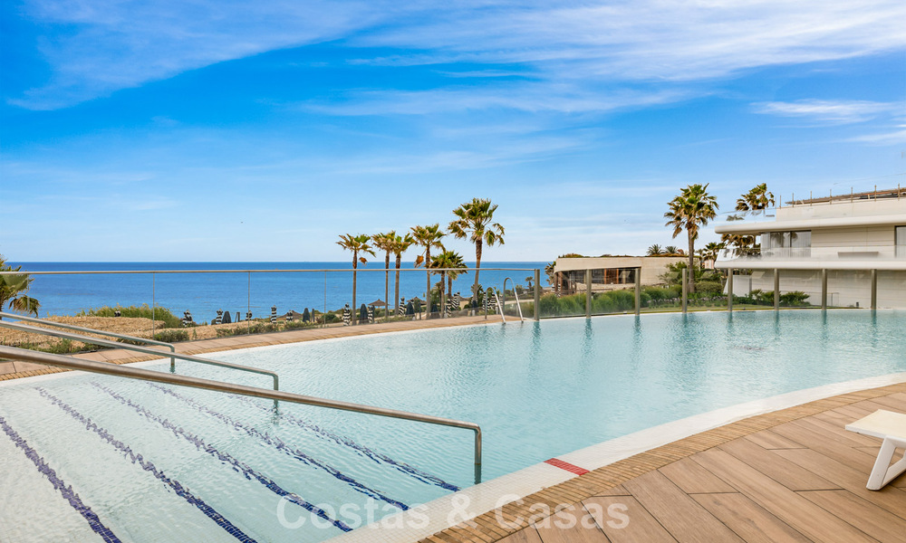 Luxurious, modern apartment with sea views for sale directly on the beach in Estepona, Costa del Sol 780804