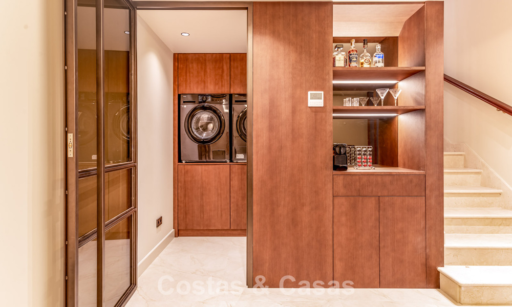 Luxurious renovated Mediterranean style townhouse for sale on Marbella’s Golden Mile 782940