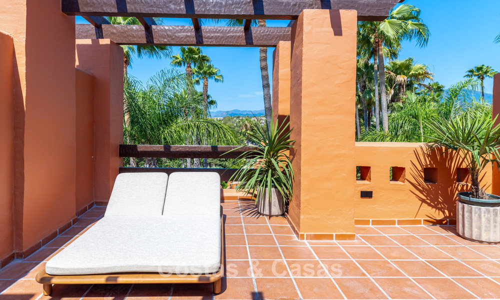 Luxurious renovated Mediterranean style townhouse for sale on Marbella’s Golden Mile 782946