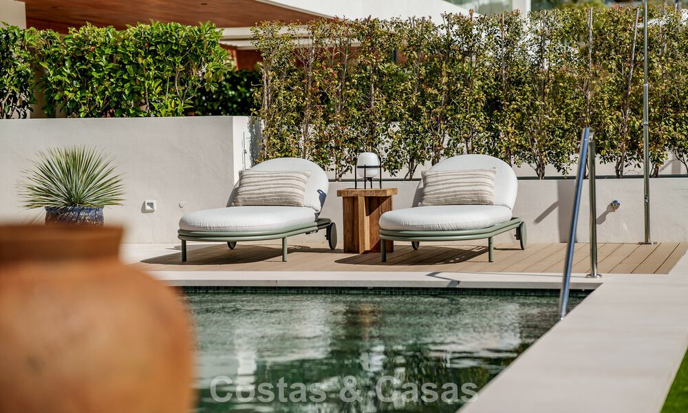 Superior triplex apartment with private garden and pool for sale in the centre of Marbella's Golden Mile 781508