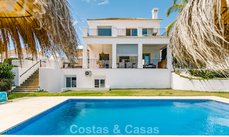 Move-in ready Mediterranean family villa for sale in a gated golf resort on the New Golden Mile between Marbella and Estepona 782166