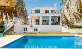 Move-in ready Mediterranean family villa for sale in a gated golf resort on the New Golden Mile between Marbella and Estepona 782166 