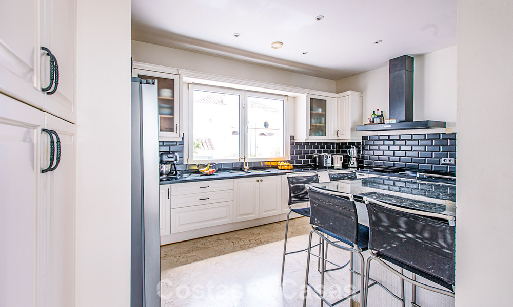 Move-in ready Mediterranean family villa for sale in a gated golf resort on the New Golden Mile between Marbella and Estepona 782175