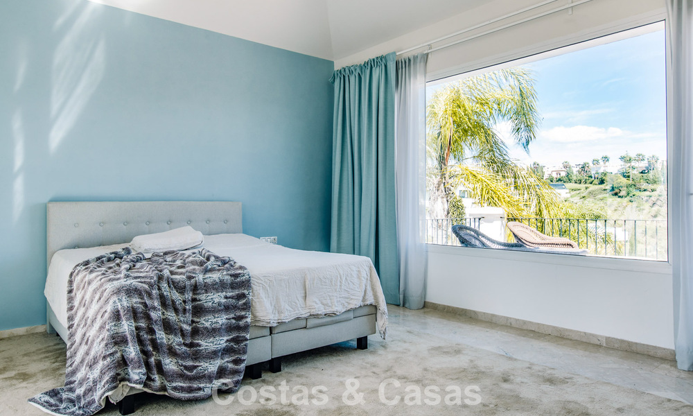 Move-in ready Mediterranean family villa for sale in a gated golf resort on the New Golden Mile between Marbella and Estepona 782188