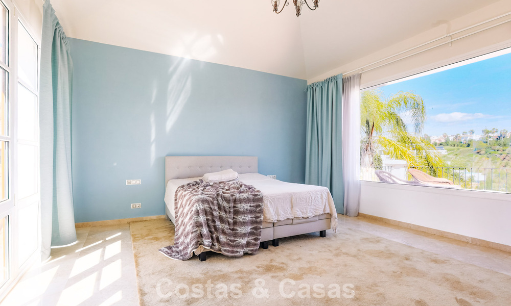 Move-in ready Mediterranean family villa for sale in a gated golf resort on the New Golden Mile between Marbella and Estepona 782189