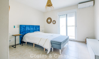 Move-in ready Mediterranean family villa for sale in a gated golf resort on the New Golden Mile between Marbella and Estepona 782194 