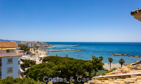Duplex penthouse with sea views for sale in a gated, frontline beach complex in Puerto Banus, Marbella 782235