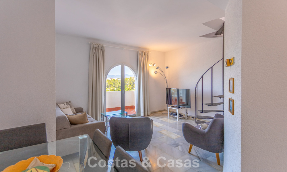 Duplex penthouse with sea views for sale in a gated, frontline beach complex in Puerto Banus, Marbella 782243