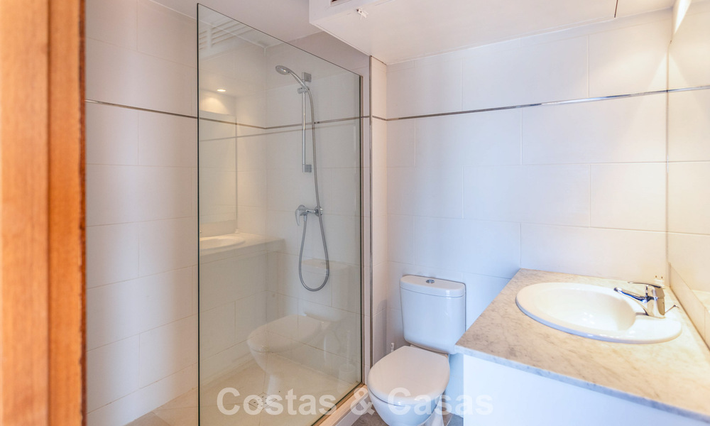 Duplex penthouse with sea views for sale in a gated, frontline beach complex in Puerto Banus, Marbella 782257