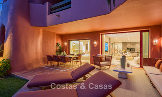 High quality renovated garden apartment with open sea views for sale, frontline beach between Marbella and Estepona 783411 