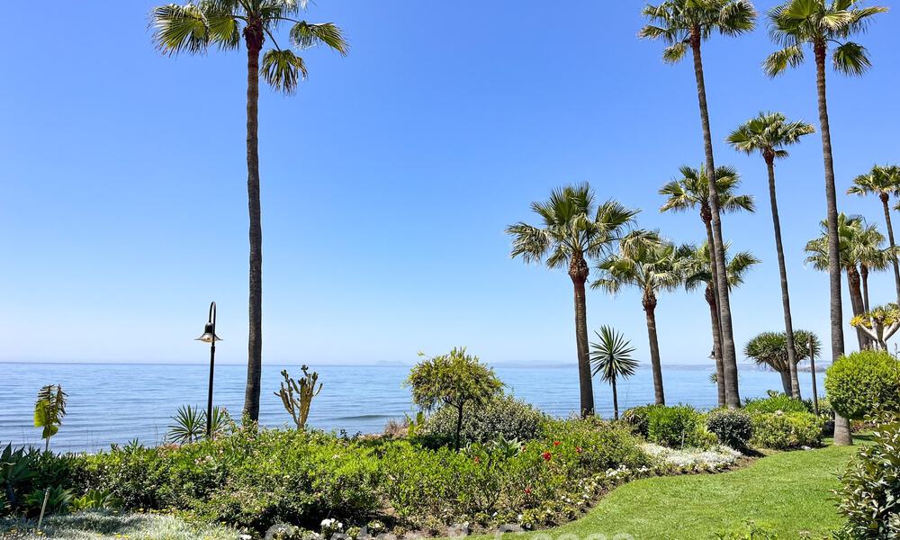 High quality renovated garden apartment with open sea views for sale, frontline beach between Marbella and Estepona 783412