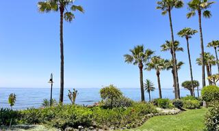 High quality renovated garden apartment with open sea views for sale, frontline beach between Marbella and Estepona 783412 