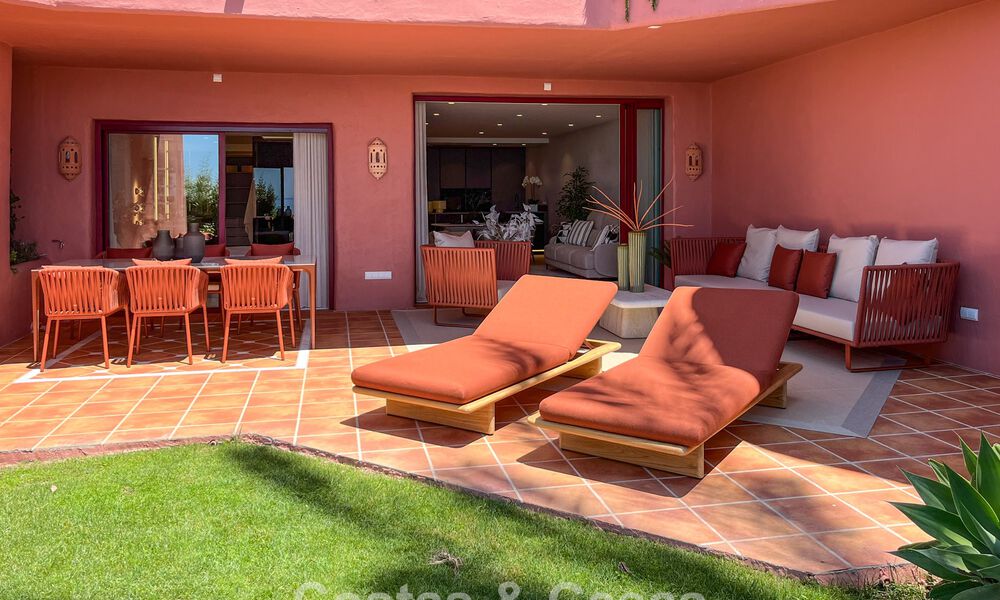 High quality renovated garden apartment with open sea views for sale, frontline beach between Marbella and Estepona 783413