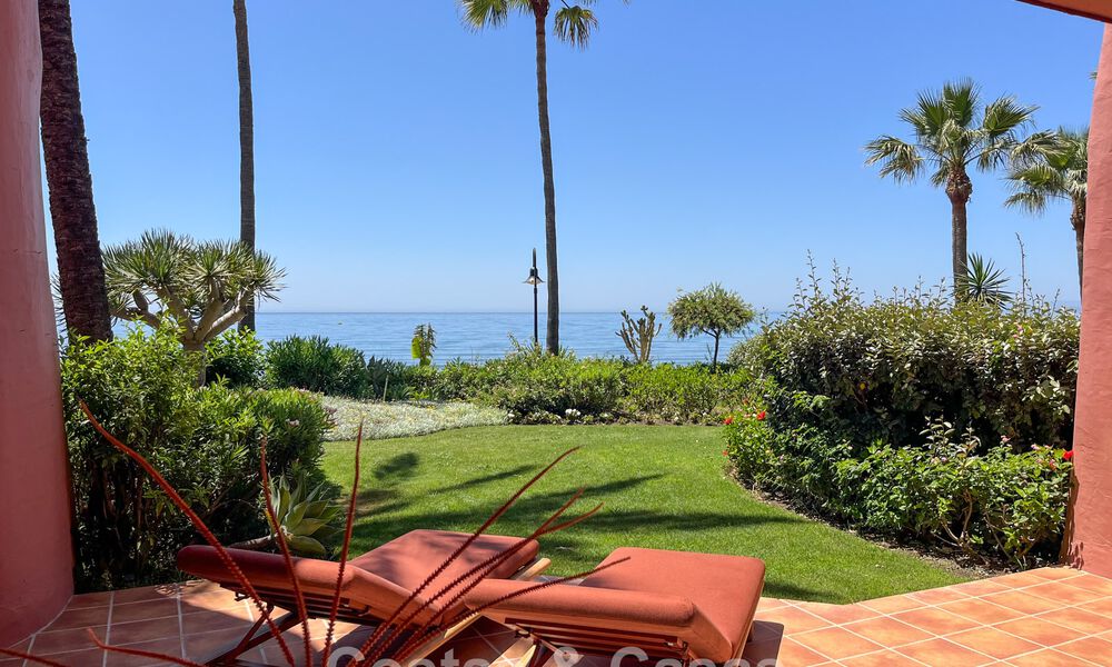 High quality renovated garden apartment with open sea views for sale, frontline beach between Marbella and Estepona 783414