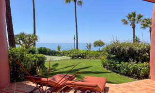 High quality renovated garden apartment with open sea views for sale, frontline beach between Marbella and Estepona 783414 