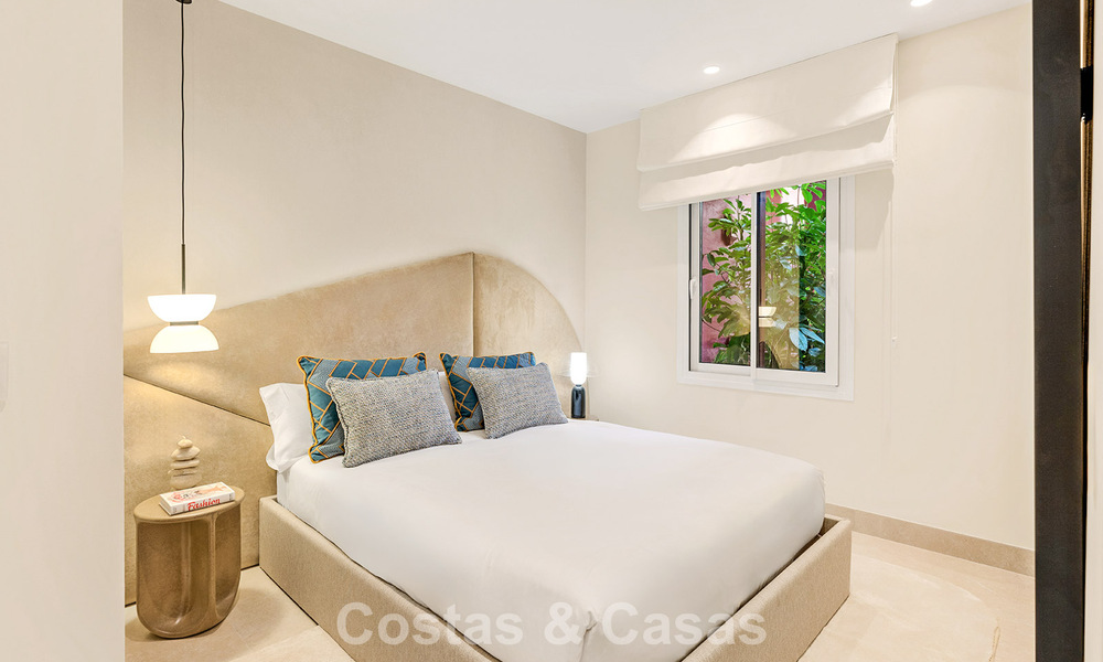 High quality renovated garden apartment with open sea views for sale, frontline beach between Marbella and Estepona 783415