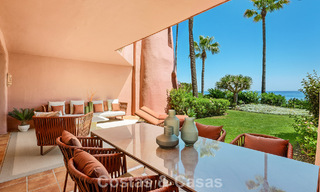 High quality renovated garden apartment with open sea views for sale, frontline beach between Marbella and Estepona 783417 