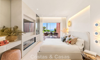 High quality renovated garden apartment with open sea views for sale, frontline beach between Marbella and Estepona 783418 