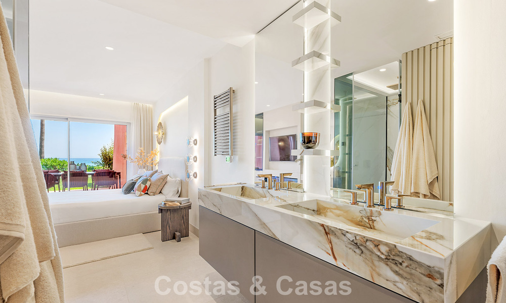 High quality renovated garden apartment with open sea views for sale, frontline beach between Marbella and Estepona 783419