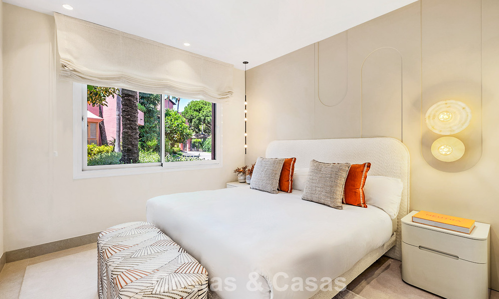 High quality renovated garden apartment with open sea views for sale, frontline beach between Marbella and Estepona 783420