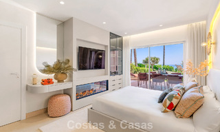 High quality renovated garden apartment with open sea views for sale, frontline beach between Marbella and Estepona 783421 