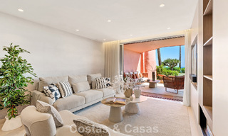 High quality renovated garden apartment with open sea views for sale, frontline beach between Marbella and Estepona 783423 