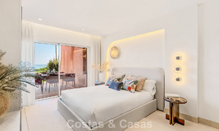 High quality renovated garden apartment with open sea views for sale, frontline beach between Marbella and Estepona 783424 
