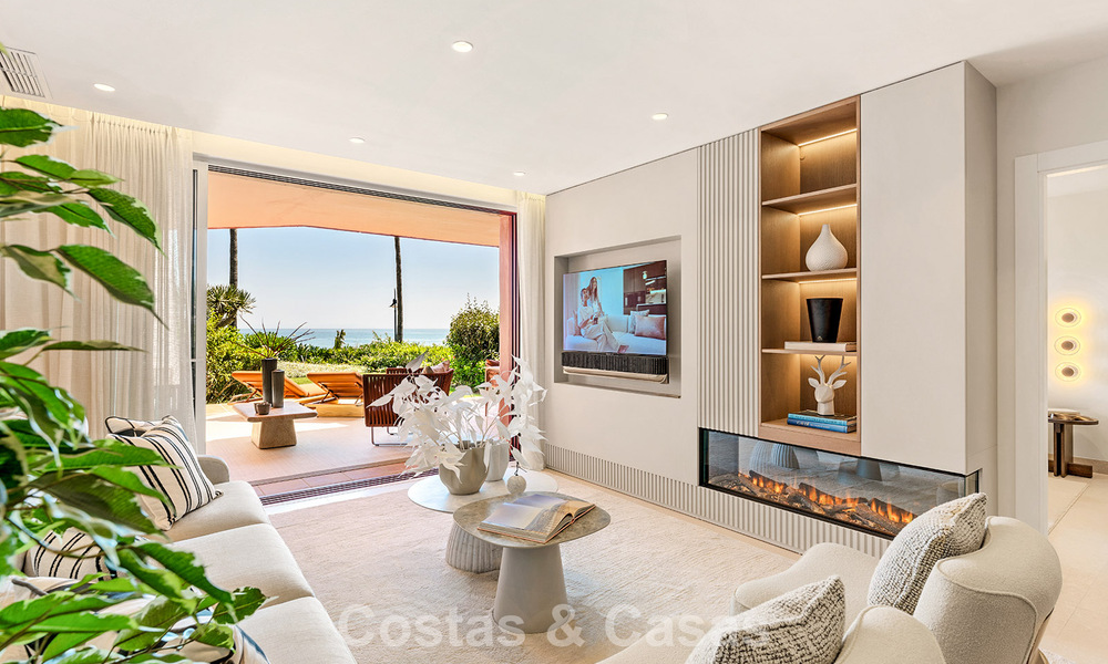 High quality renovated garden apartment with open sea views for sale, frontline beach between Marbella and Estepona 783425