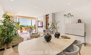 High quality renovated garden apartment with open sea views for sale, frontline beach between Marbella and Estepona 783426 