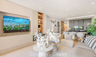 High quality renovated garden apartment with open sea views for sale, frontline beach between Marbella and Estepona 783429 