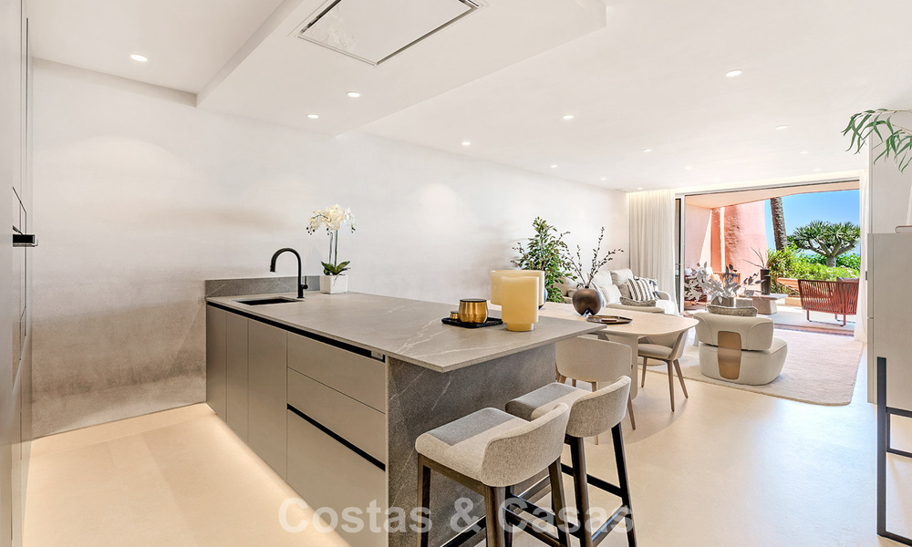 High quality renovated garden apartment with open sea views for sale, frontline beach between Marbella and Estepona 783430